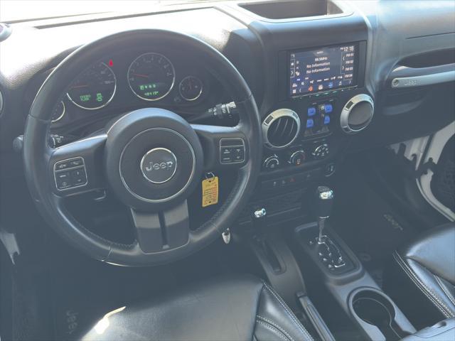 used 2015 Jeep Wrangler Unlimited car, priced at $27,900