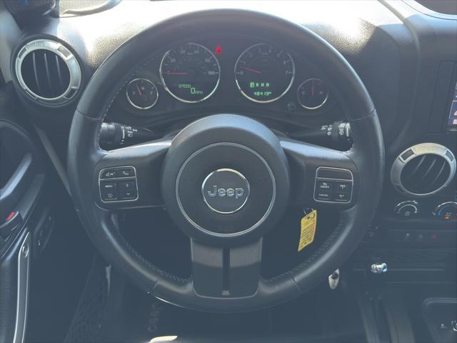 used 2015 Jeep Wrangler Unlimited car, priced at $27,900