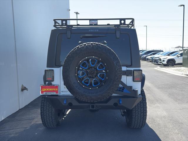 used 2015 Jeep Wrangler Unlimited car, priced at $27,900