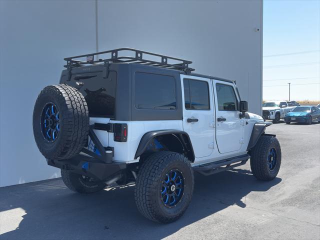 used 2015 Jeep Wrangler Unlimited car, priced at $27,900