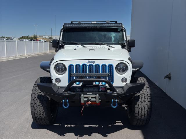 used 2015 Jeep Wrangler Unlimited car, priced at $27,900