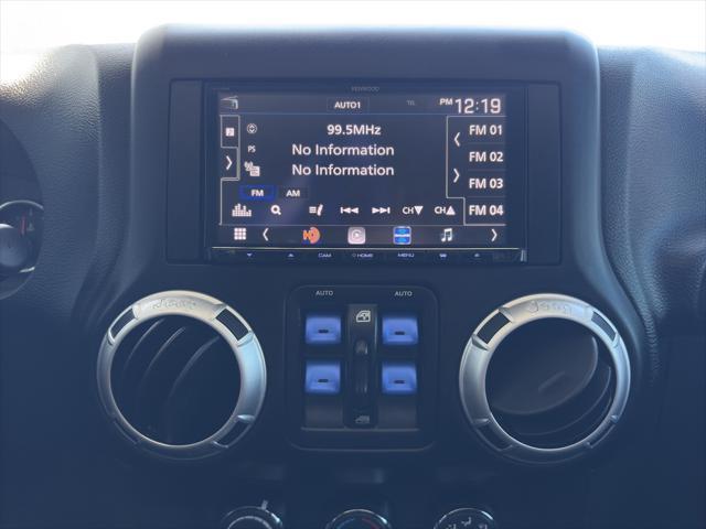 used 2015 Jeep Wrangler Unlimited car, priced at $27,900