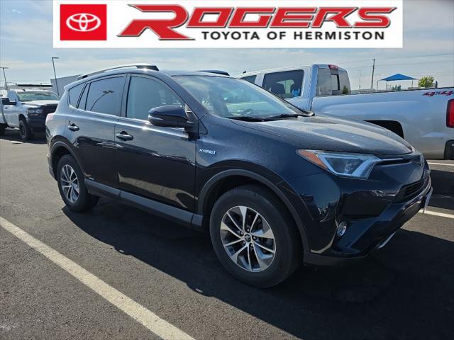 used 2018 Toyota RAV4 Hybrid car, priced at $23,900