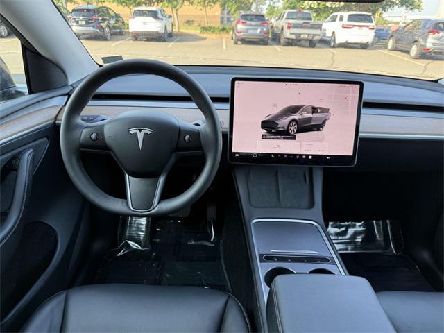 used 2023 Tesla Model Y car, priced at $30,000