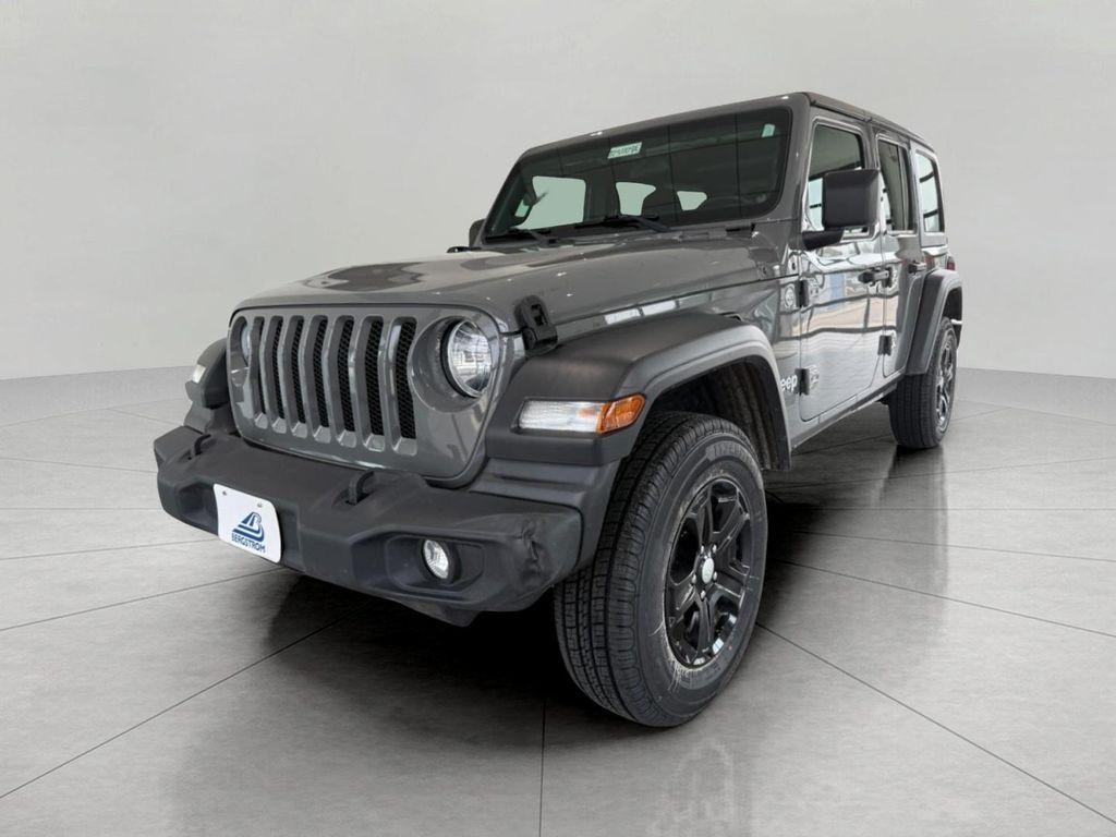 used 2021 Jeep Wrangler Unlimited car, priced at $25,392