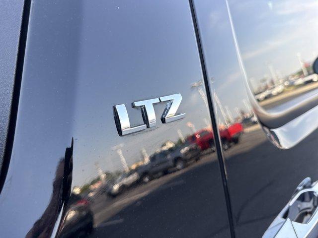 used 2010 Chevrolet Avalanche car, priced at $13,500