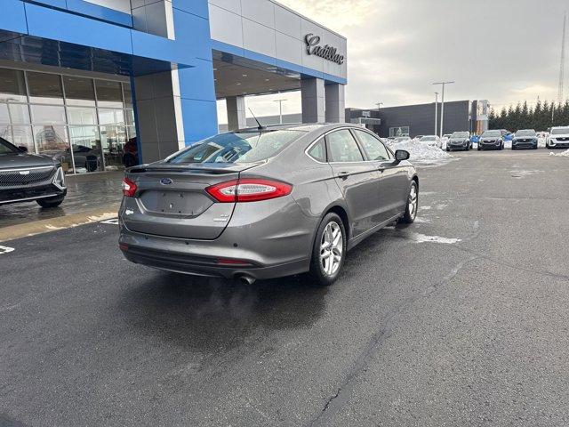 used 2013 Ford Fusion car, priced at $6,000