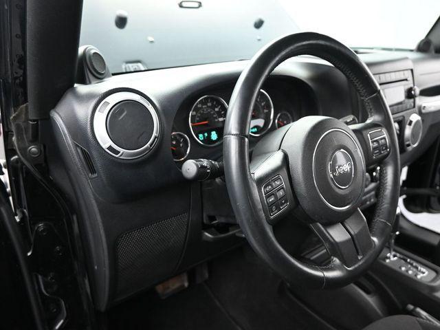 used 2013 Jeep Wrangler Unlimited car, priced at $16,633