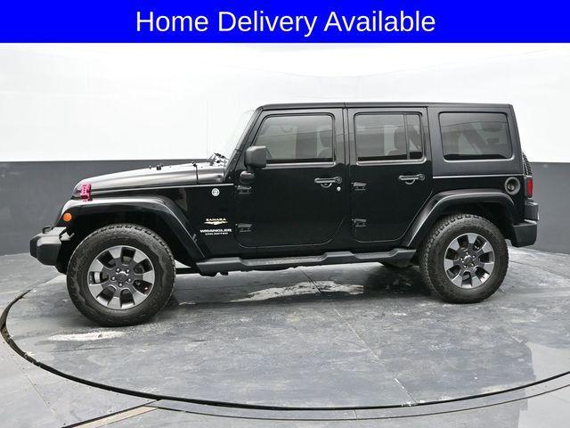 used 2013 Jeep Wrangler Unlimited car, priced at $16,633