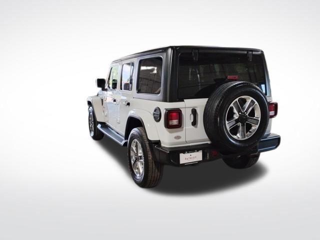 used 2021 Jeep Wrangler Unlimited car, priced at $27,867