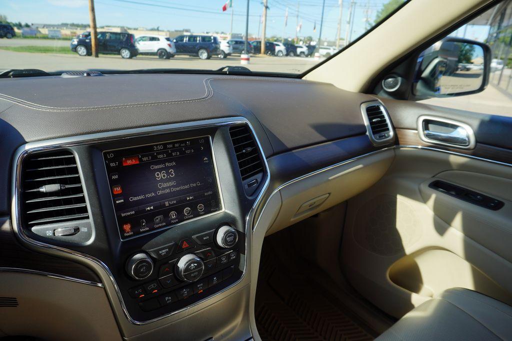 used 2014 Jeep Grand Cherokee car, priced at $13,220