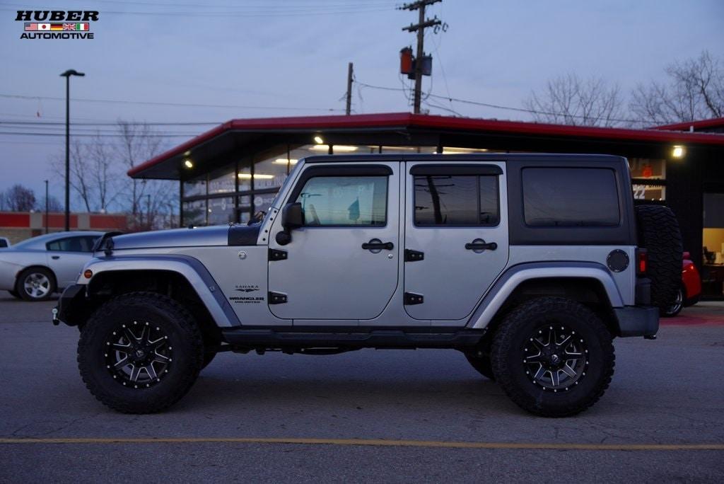 used 2016 Jeep Wrangler Unlimited car, priced at $23,049