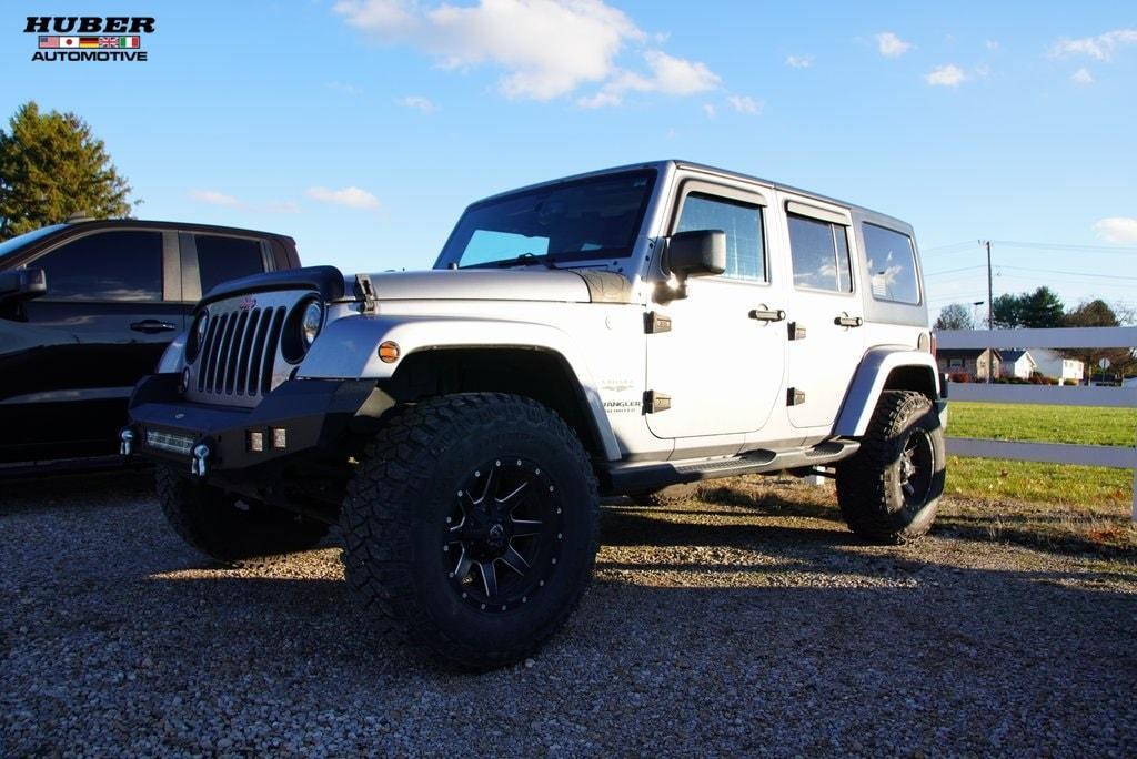 used 2016 Jeep Wrangler Unlimited car, priced at $23,049