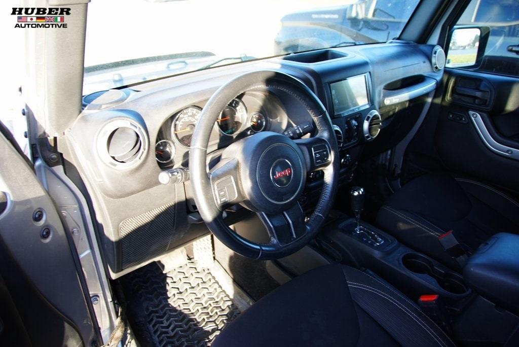 used 2016 Jeep Wrangler Unlimited car, priced at $23,049