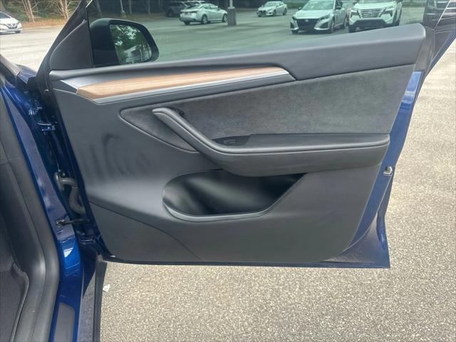 used 2024 Tesla Model Y car, priced at $34,693