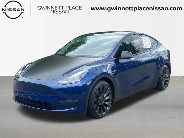 used 2024 Tesla Model Y car, priced at $34,693