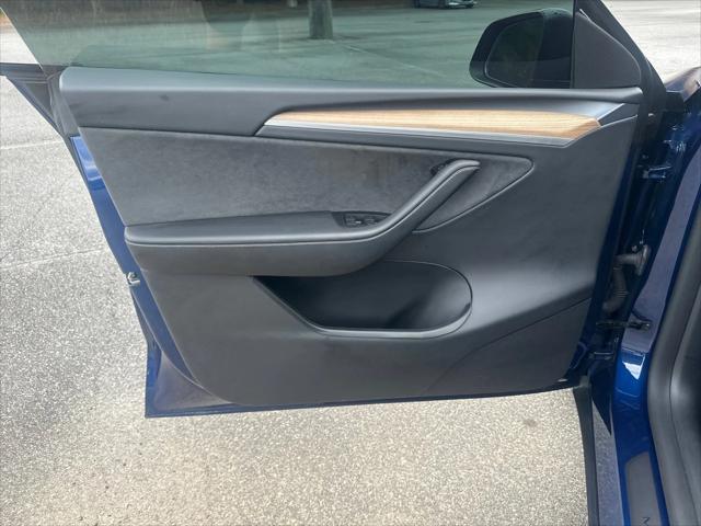 used 2024 Tesla Model Y car, priced at $34,693