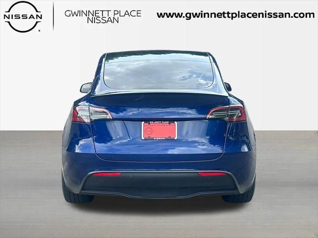 used 2024 Tesla Model Y car, priced at $34,693