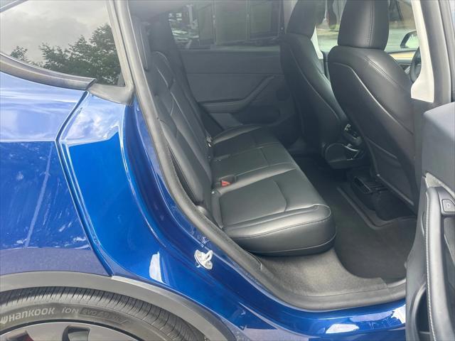 used 2024 Tesla Model Y car, priced at $34,693