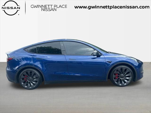 used 2024 Tesla Model Y car, priced at $34,693