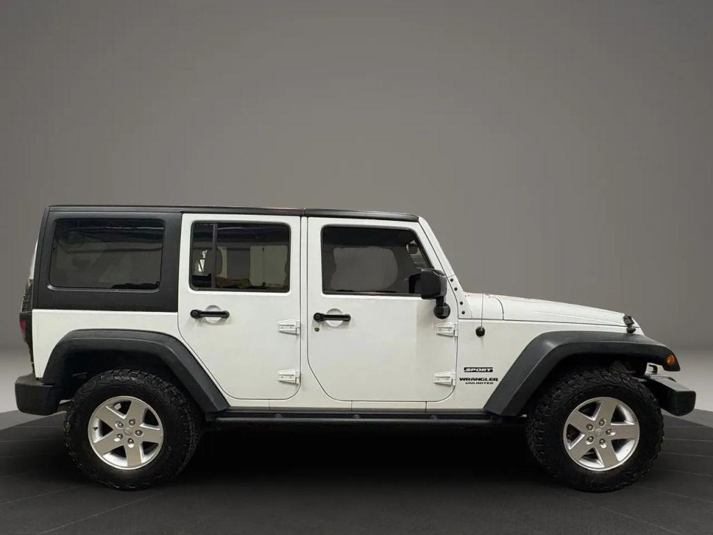 used 2015 Jeep Wrangler Unlimited car, priced at $13,885