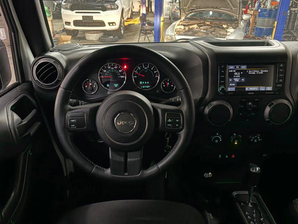 used 2015 Jeep Wrangler Unlimited car, priced at $13,885