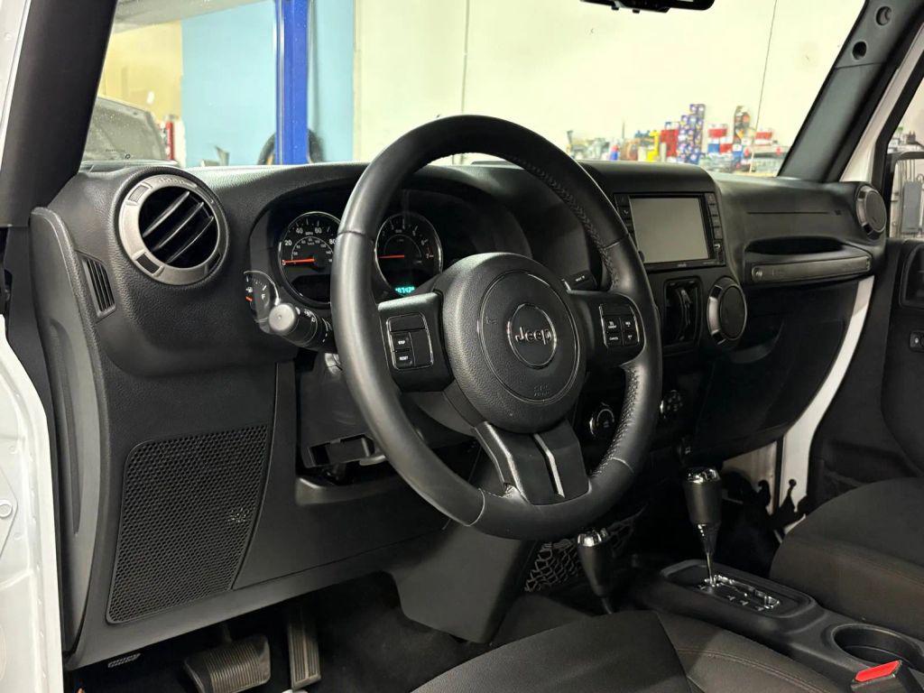 used 2015 Jeep Wrangler Unlimited car, priced at $13,885
