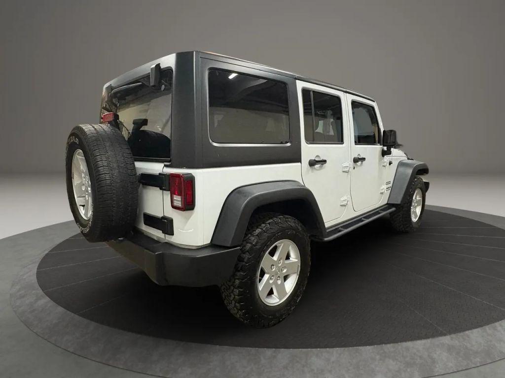 used 2015 Jeep Wrangler Unlimited car, priced at $13,885