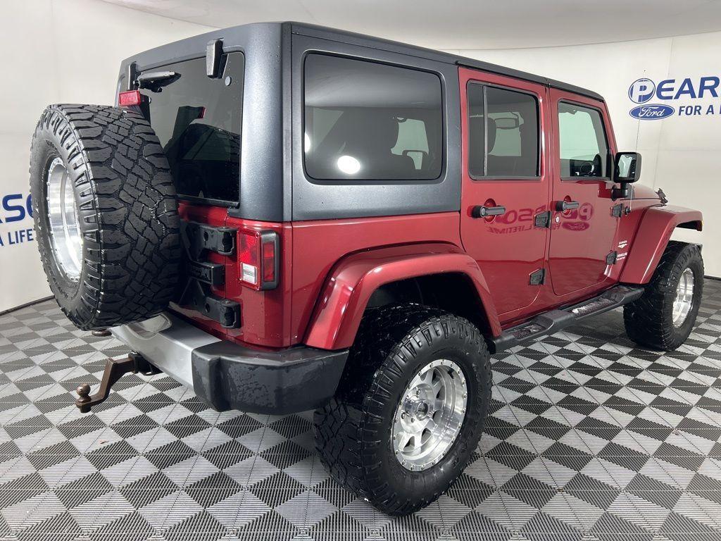 used 2013 Jeep Wrangler Unlimited car, priced at $13,990