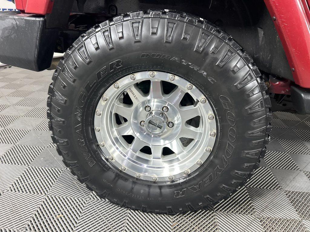 used 2013 Jeep Wrangler Unlimited car, priced at $13,990