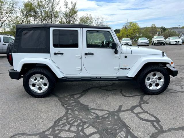 used 2015 Jeep Wrangler Unlimited car, priced at $16,595
