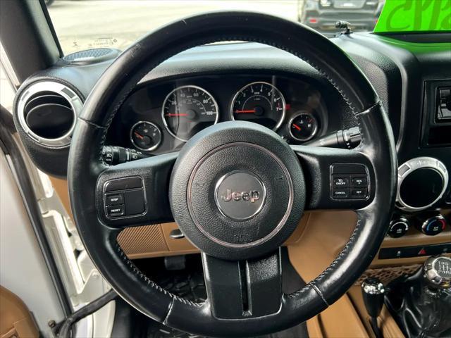 used 2015 Jeep Wrangler Unlimited car, priced at $16,595