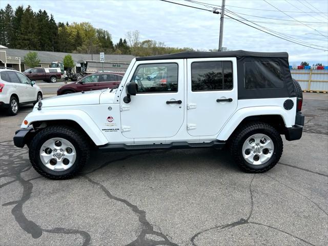used 2015 Jeep Wrangler Unlimited car, priced at $16,595