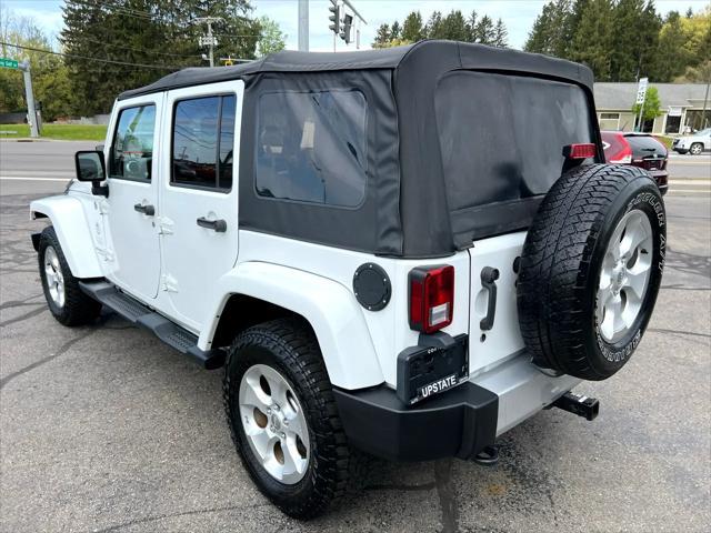 used 2015 Jeep Wrangler Unlimited car, priced at $16,595