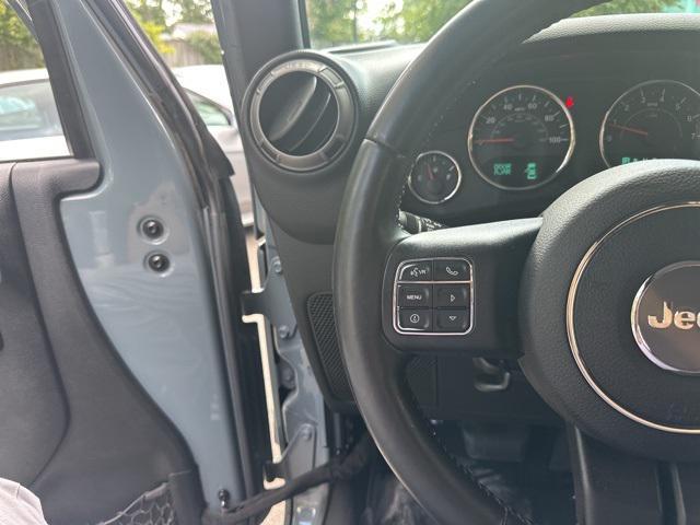 used 2015 Jeep Wrangler Unlimited car, priced at $18,979