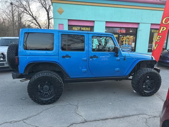 used 2015 Jeep Wrangler Unlimited car, priced at $16,989