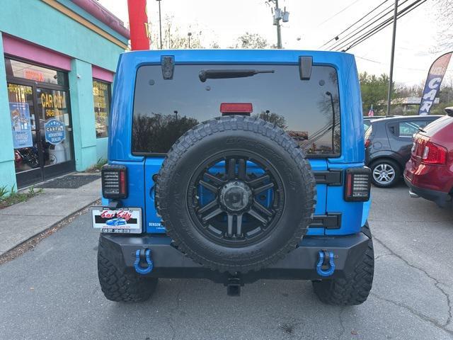 used 2015 Jeep Wrangler Unlimited car, priced at $16,989