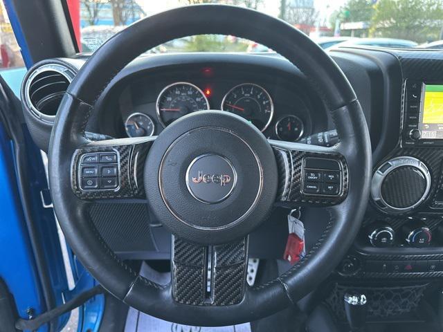 used 2015 Jeep Wrangler Unlimited car, priced at $16,989