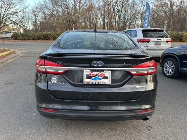 used 2018 Ford Fusion car, priced at $8,979