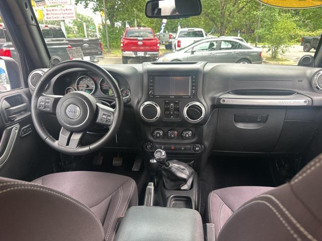 used 2014 Jeep Wrangler Unlimited car, priced at $15,479