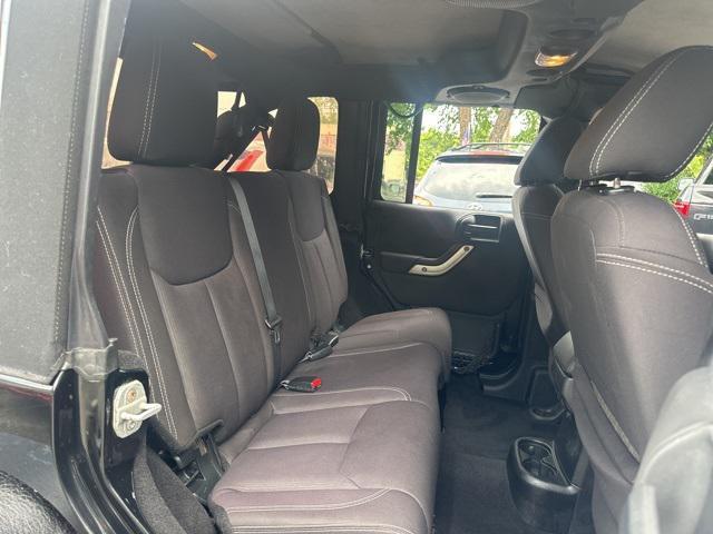 used 2014 Jeep Wrangler Unlimited car, priced at $15,479