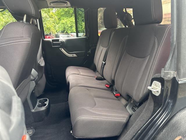 used 2014 Jeep Wrangler Unlimited car, priced at $15,479