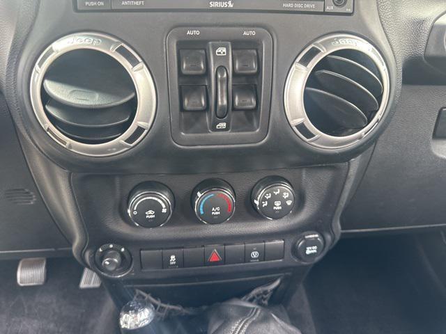 used 2014 Jeep Wrangler Unlimited car, priced at $15,479
