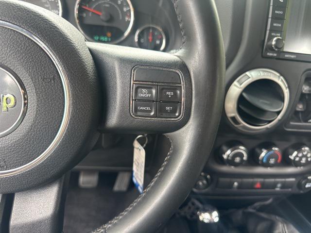 used 2014 Jeep Wrangler Unlimited car, priced at $15,479