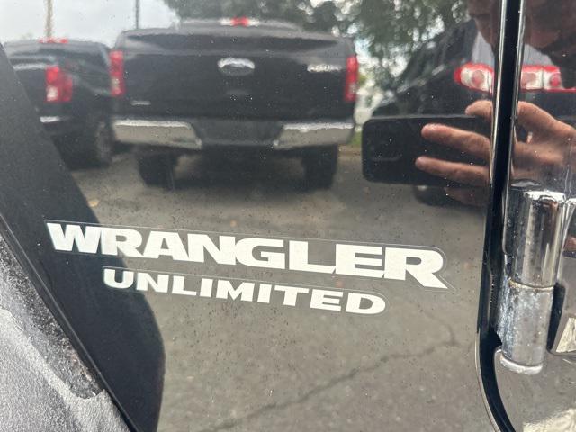 used 2014 Jeep Wrangler Unlimited car, priced at $15,479