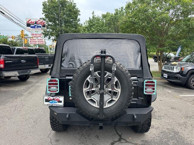 used 2014 Jeep Wrangler Unlimited car, priced at $15,479