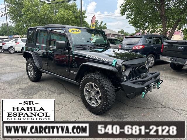 used 2014 Jeep Wrangler Unlimited car, priced at $16,989