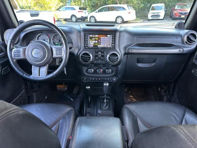 used 2013 Jeep Wrangler Unlimited car, priced at $15,979