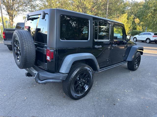 used 2013 Jeep Wrangler Unlimited car, priced at $15,979