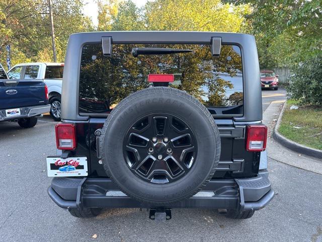 used 2013 Jeep Wrangler Unlimited car, priced at $15,979